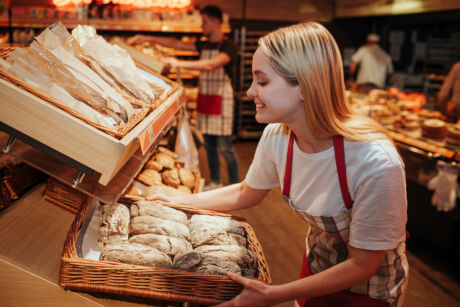 Young woman hold bakset with